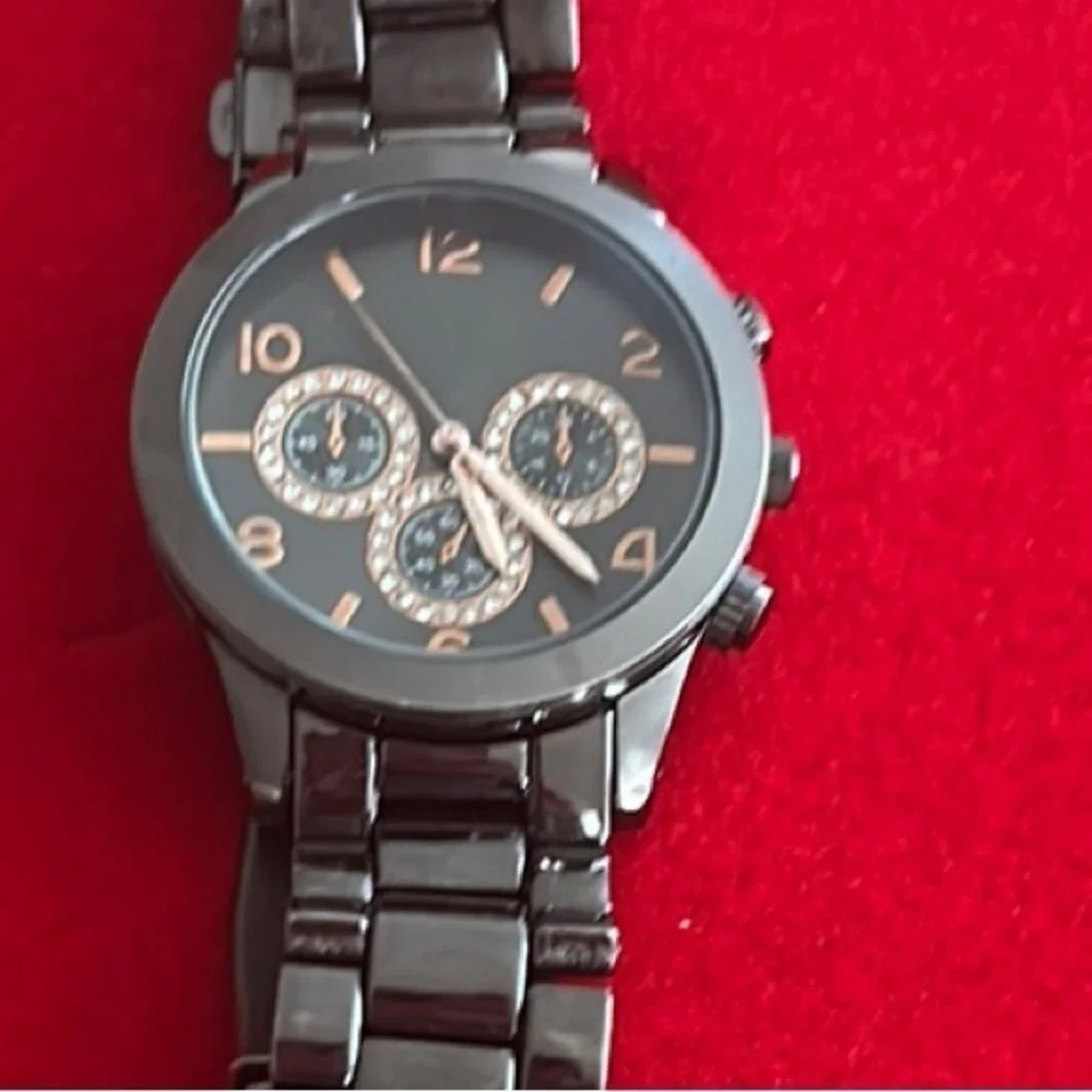 Black Metal Watch with Gold Accents